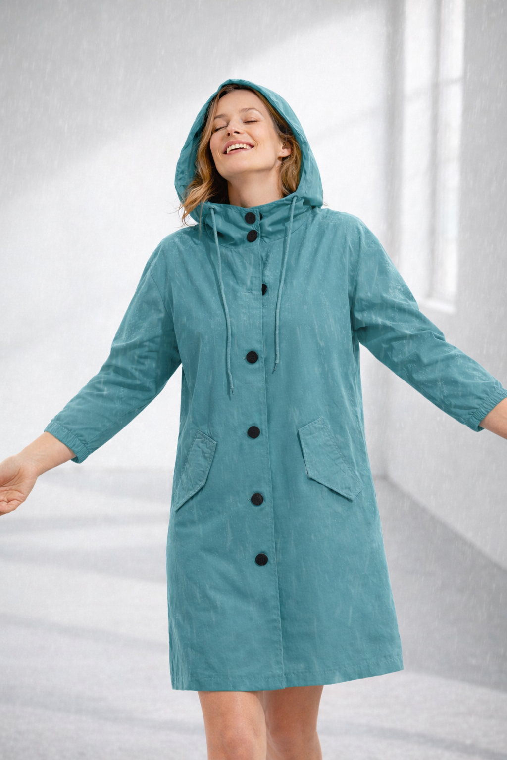 Mid-Length Hooded Jacket with Button Front and Shortened Sleeves Modeberg Bern